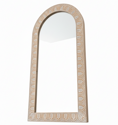 Decorative mirror with an ornate frame on a white background